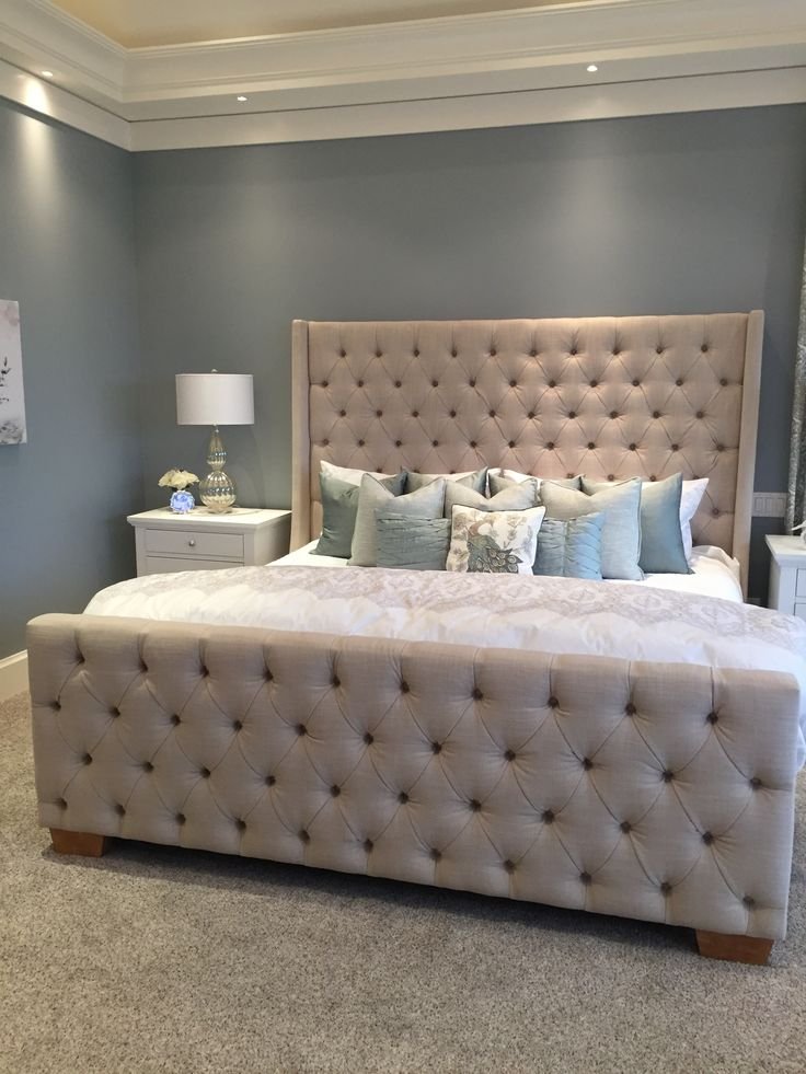 Ambassador Bed — elegant upholstered bed with deep-button detailing
